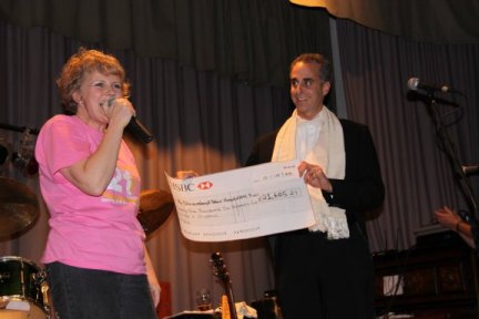Kay presents the cheque